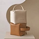 Durable leather material and spacious interior, this pouch is perfect for on-the-go touch-ups or daily use. Our manufacturer guarantees quality craftsmanship and attention to detail, making this pouch a timeless addition to your beauty routine.