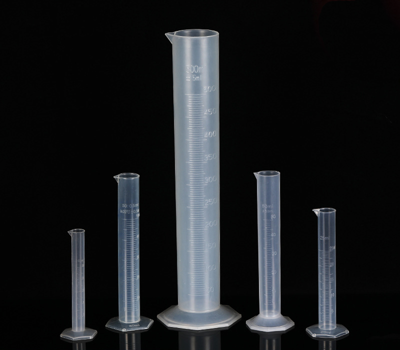 Plastic measuring cylinder in chemistry lab science lab