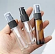 Empty travel size vials
Small sprayer perfume bottle
